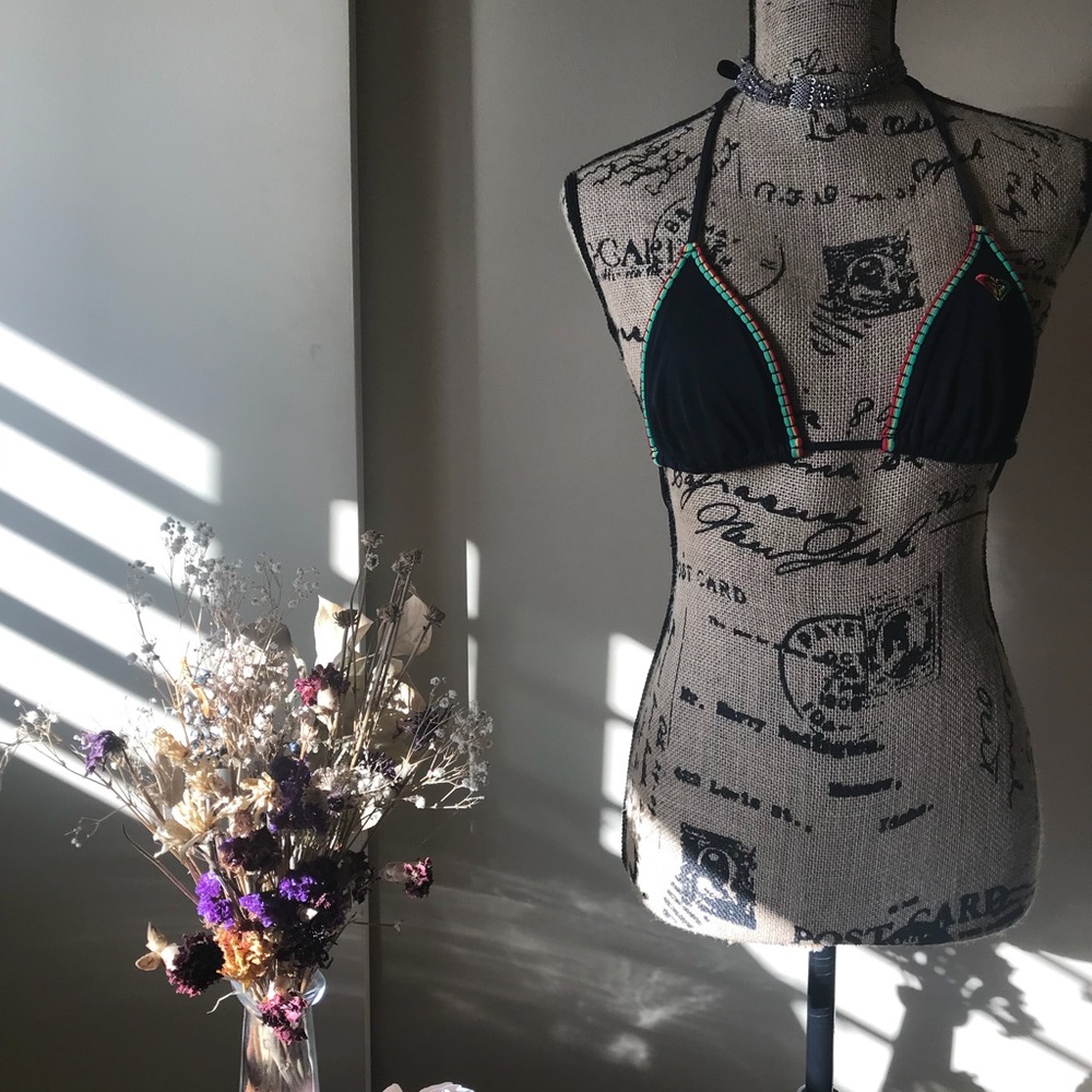 Roxy Rasta and black bikini top